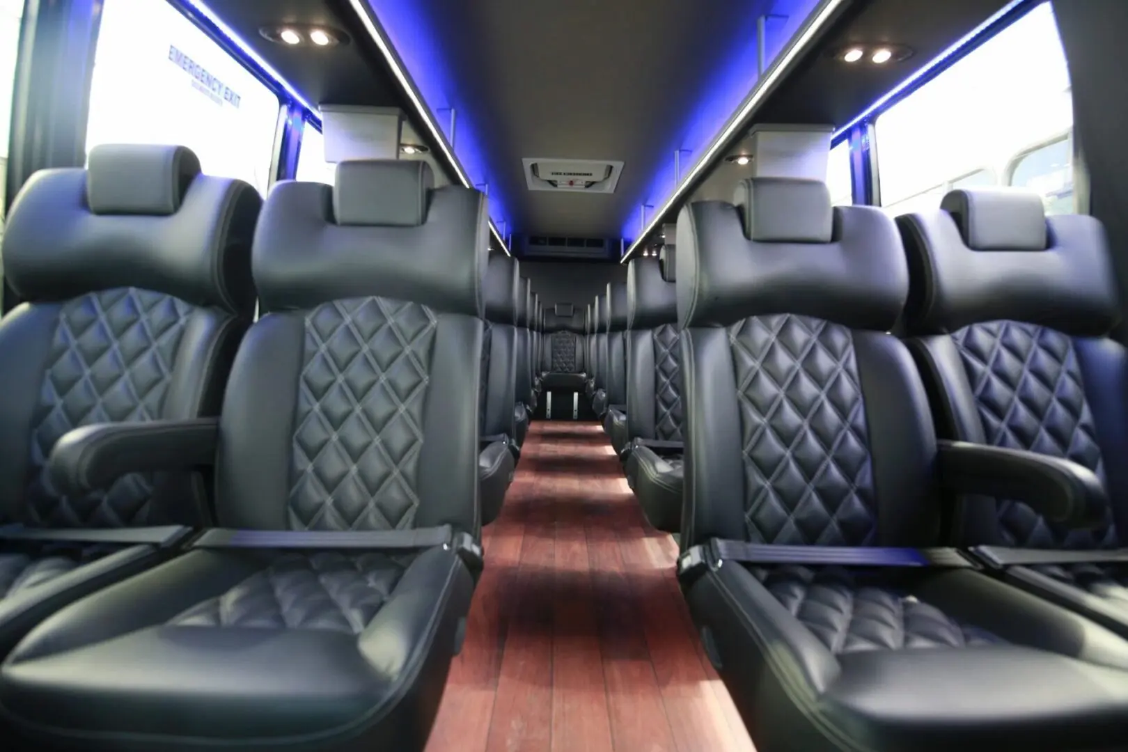 Luxury limo interior with plush leather seating, ideal for corporate transportation and VIP travel.